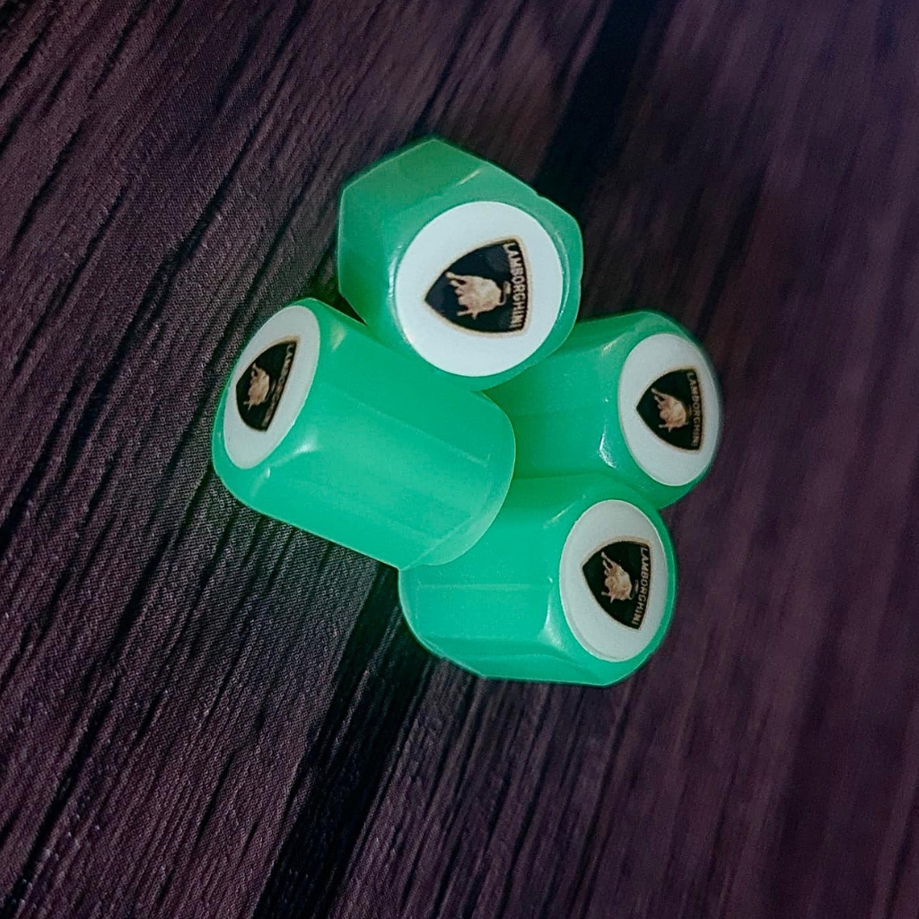 Set 4 Pokrovov Za Kolesa s Fosforescentnim Logotipom